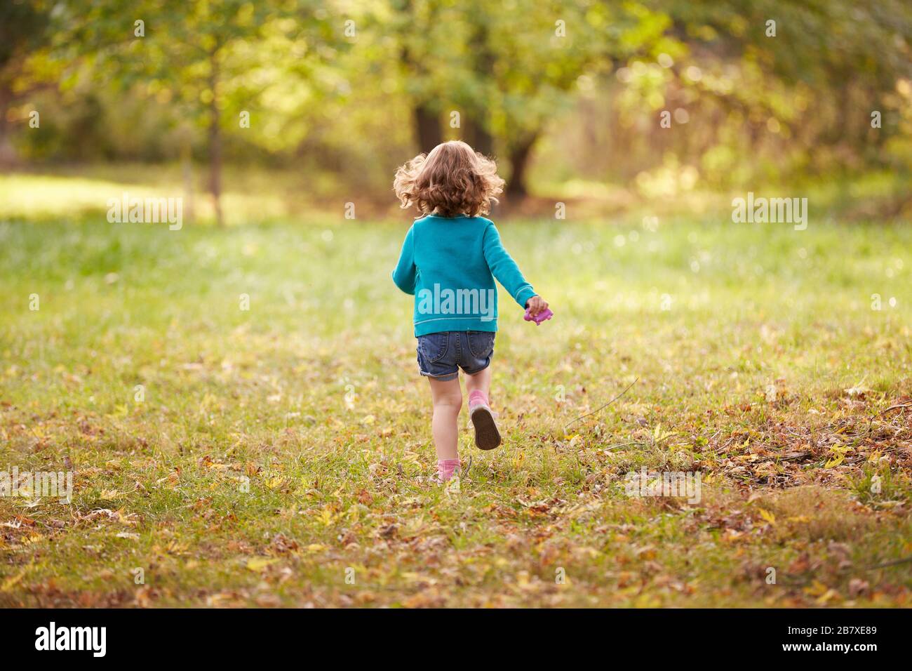 Child running from behind hires stock photography and images Alamy