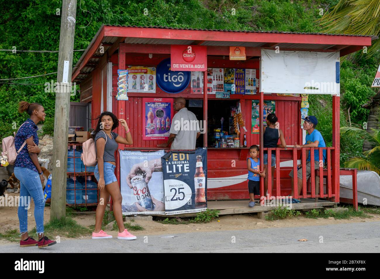 People at local grocery store, Gravel bay, Roatan, Honduras Stock Photo