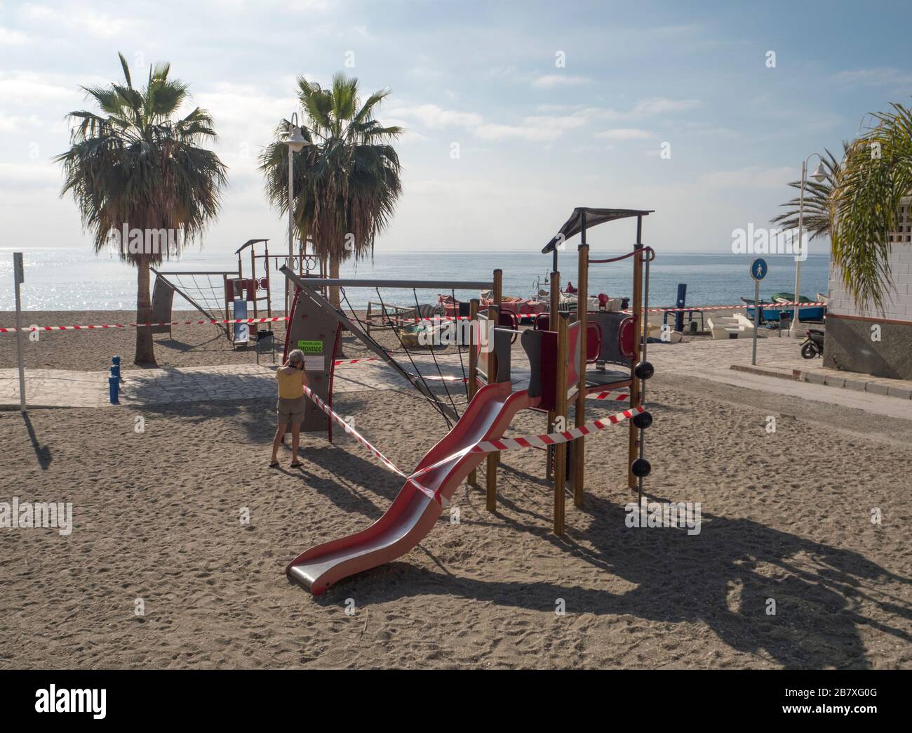 Corvid19 lock down in Spain closes play area on Burriana Beach, Nerja, Adalucia, Spain Stock Photo