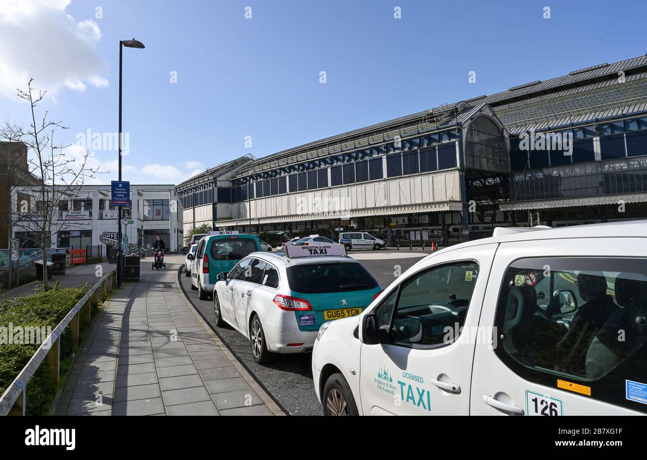 Taxis parked at the back of Brighton Railway Station during the Coronavirus COVID-19 pandemic crisis UK Stock Photo