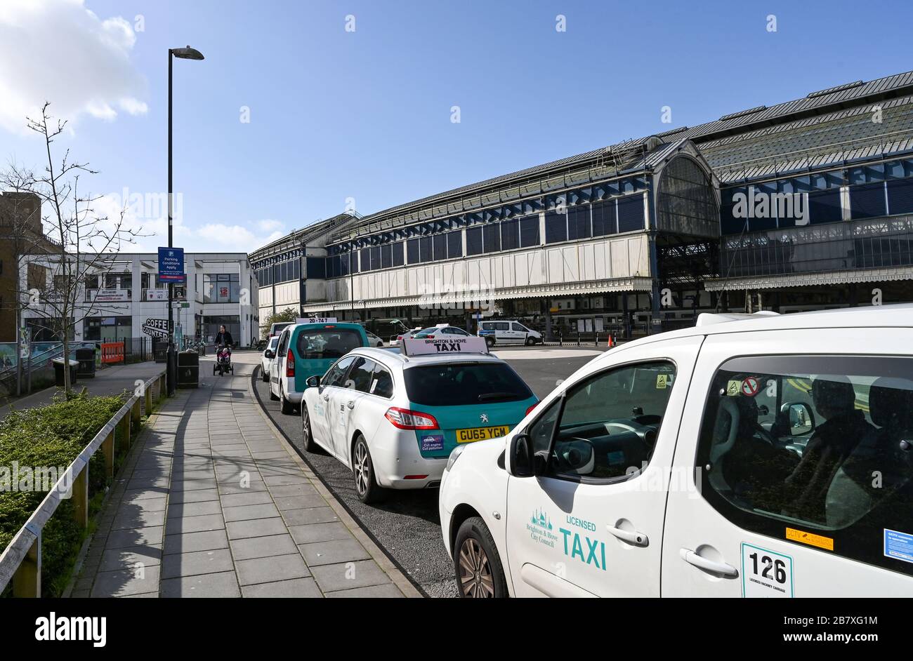 Taxis parked at the back of Brighton Railway Station during the Coronavirus COVID-19 pandemic crisis UK Stock Photo