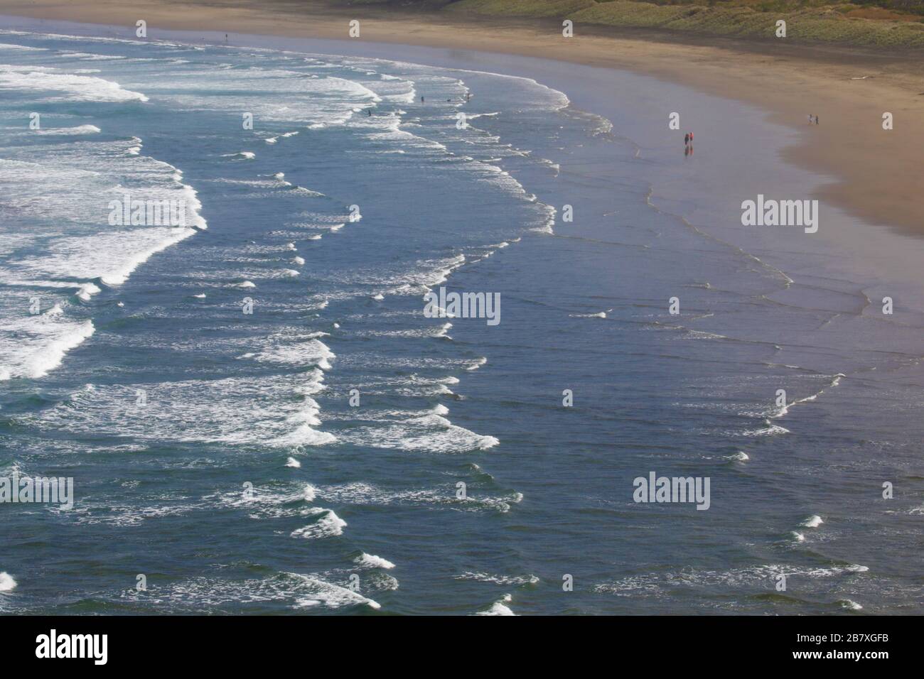 Huge New Zealand beach with few people Stock Photo