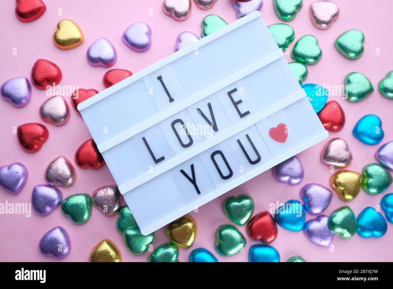 I love you text on light box sign on color background . Stock Photo