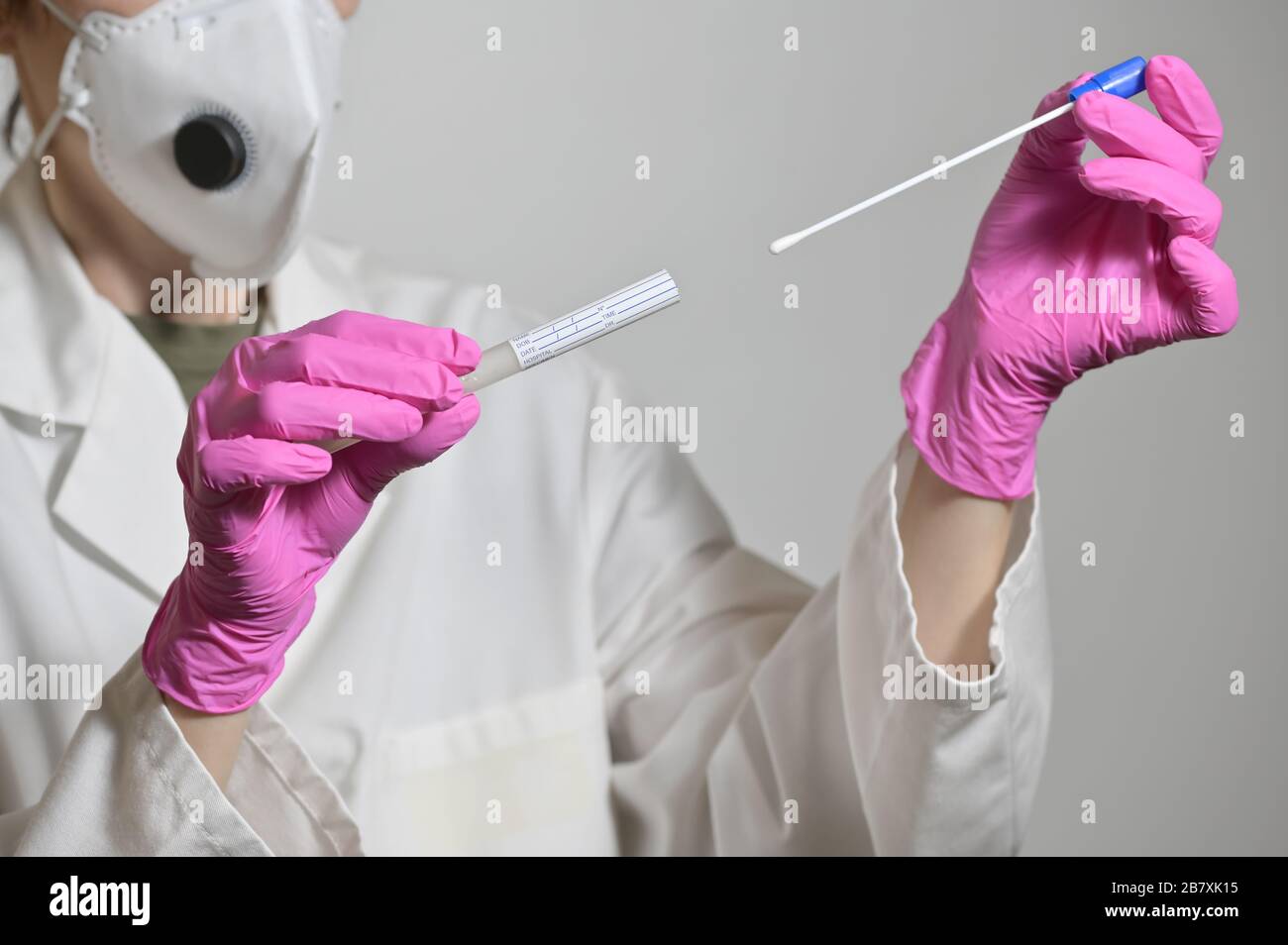 Nurse Holds A Swab For The Coronavirus / Covid19 Test Stock Photo