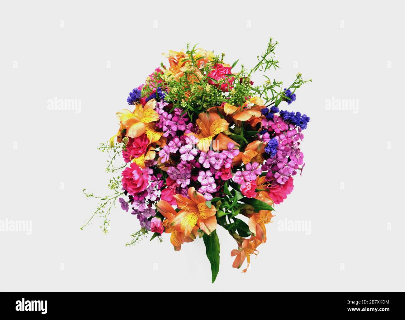 Overhead view of a colourful bouquet of mixed flowers against a white background Stock Photo
