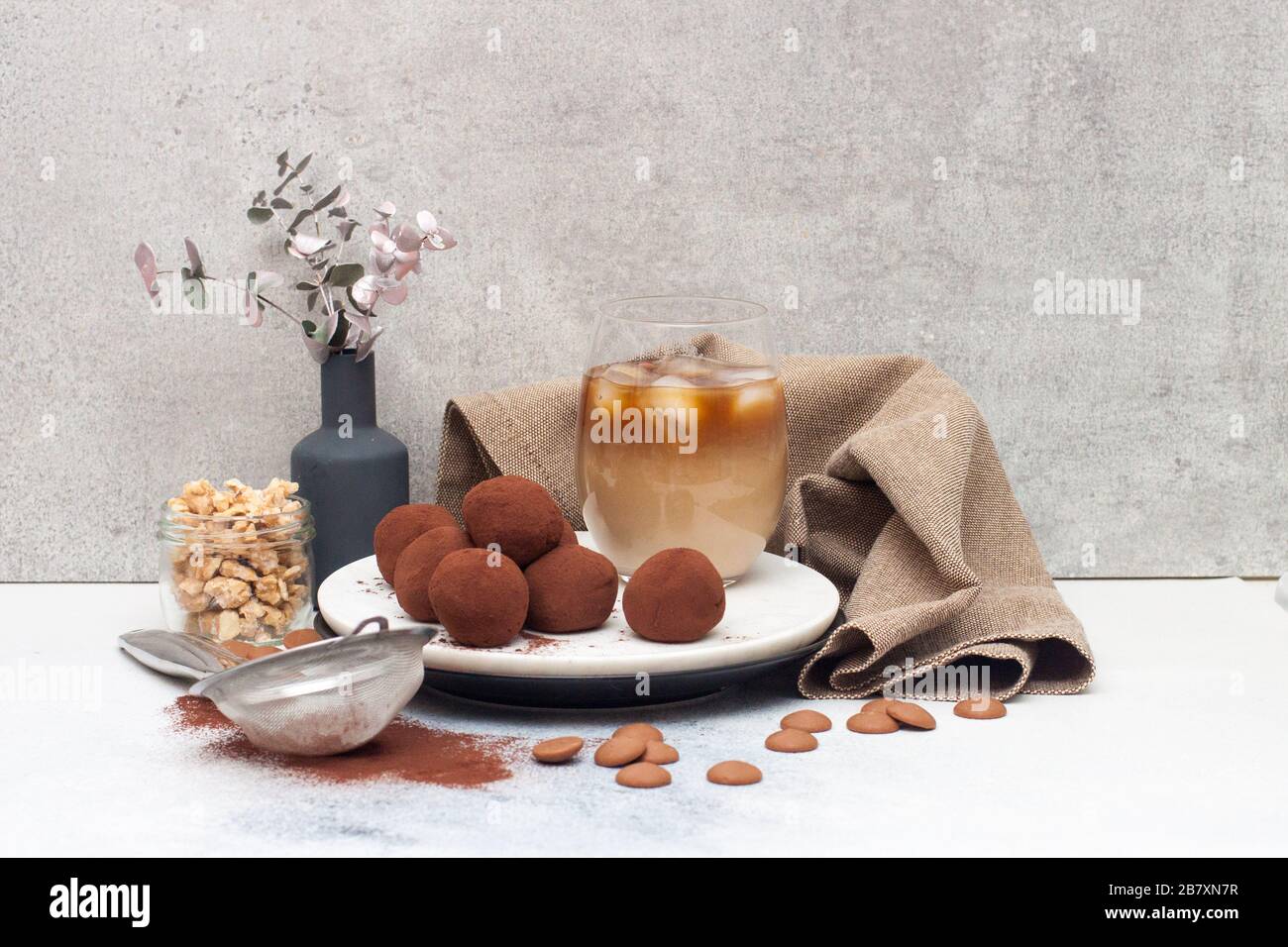 Cold coffee liqueur with chocolate truffles, rolled in cocoa powder on