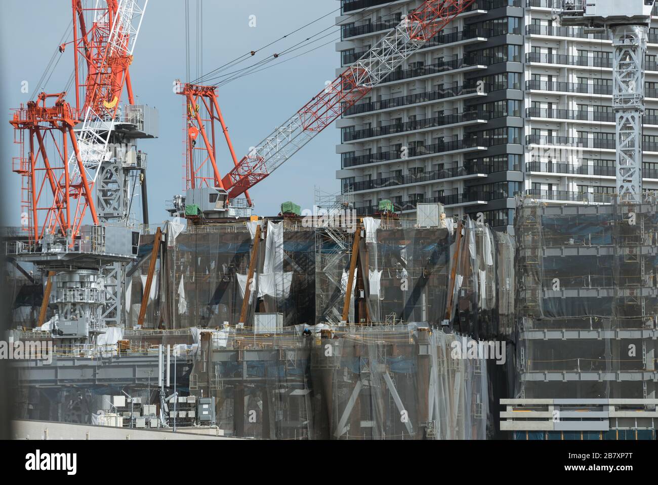 buildings under construction and cranes in Tokyo Stock Photo