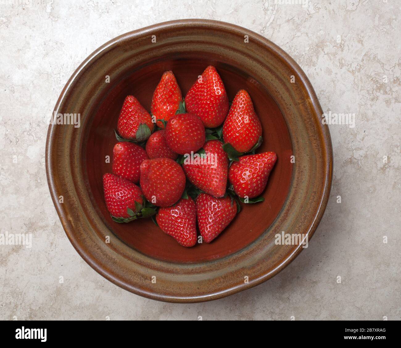 Fresh strawberries in a bowl Stock Photo