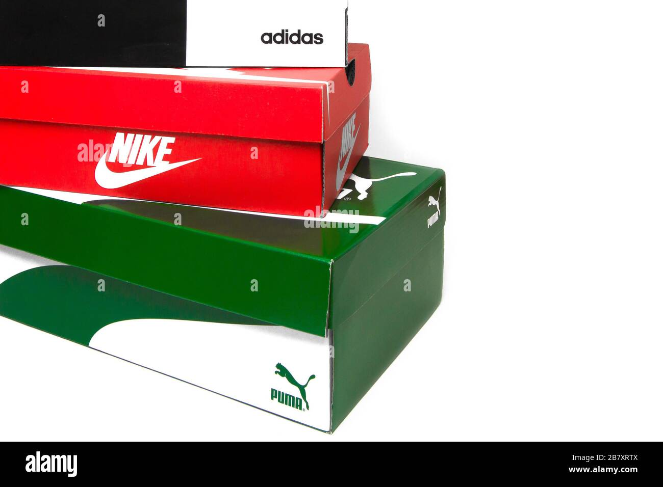 Puma, Adidas, Nile shoes boxes are isolated on a white background. Concept  of shoe shop advertising. San Francisco, USA, March 2020 Stock Photo - Alamy