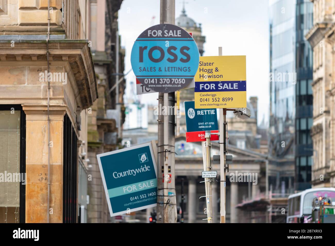for sale and to let signs in Glasgow city centre, Scotland, UK Stock Photo