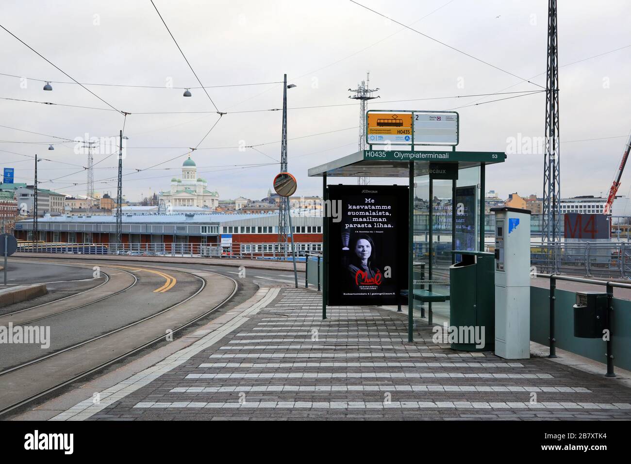 Helsinki, Finland. March 18, 2020. Empty tram stop and deserted street during Coronavirus pandemic by South Harbour, Helsinki. Stock Photo