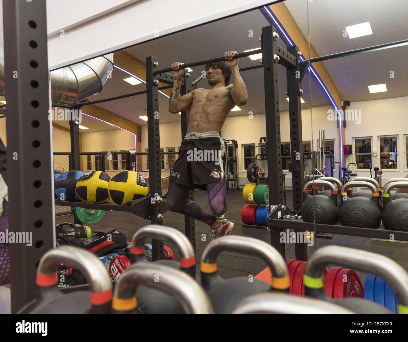Close up view of a male doing pull-ups. Healthy lifestyle concept.  Enkoping. Sweden. Stock Photo