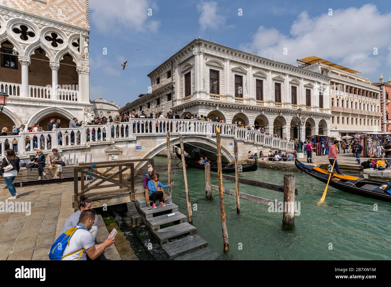 Bridge Ponte della Paglia at Piazza San Marco or st Mark square, Campanile and Ducale or Doge Palace in Venice, Italy Stock Photo