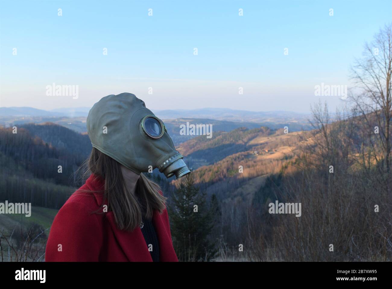 Girl wears gas mask Stock Photo