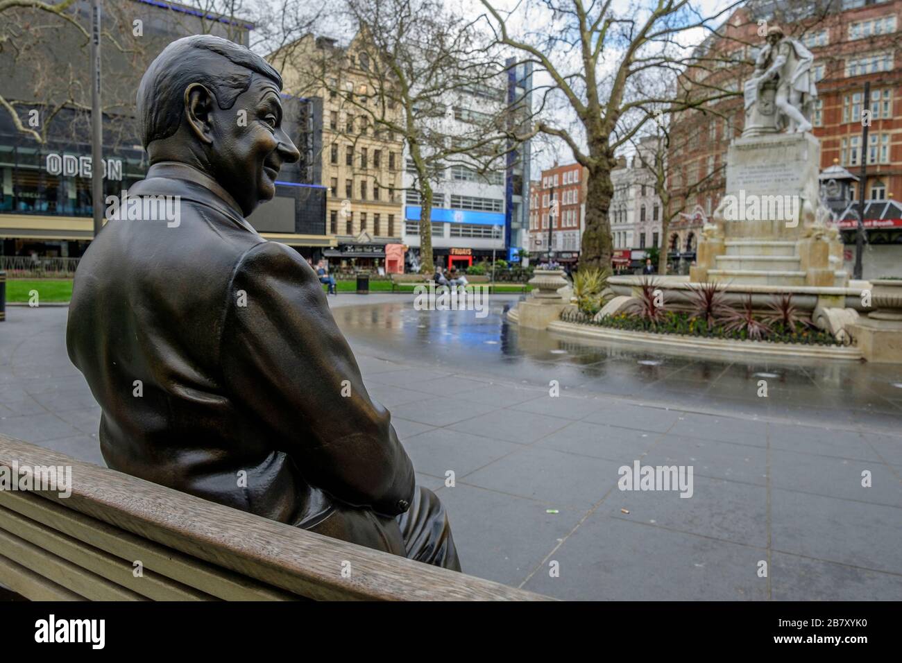 London, UK 18 March 2020. A statue of popular movie character, Mr Bean, sits alone in Leicester Square, an area normally busy with visitors to the capital. Stock Photo