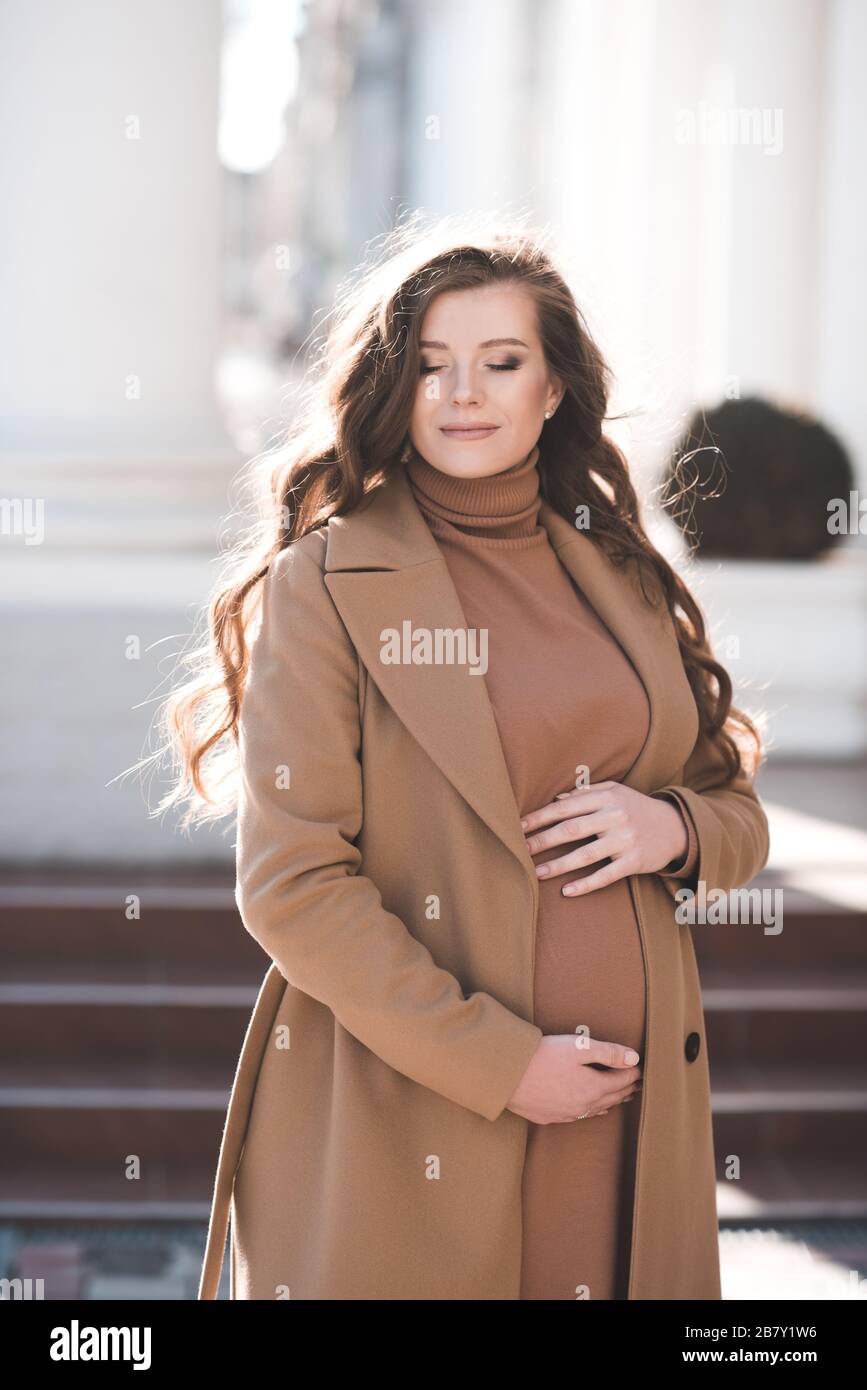 Portrait pregnant woman curly hair hi-res stock photography and images ...