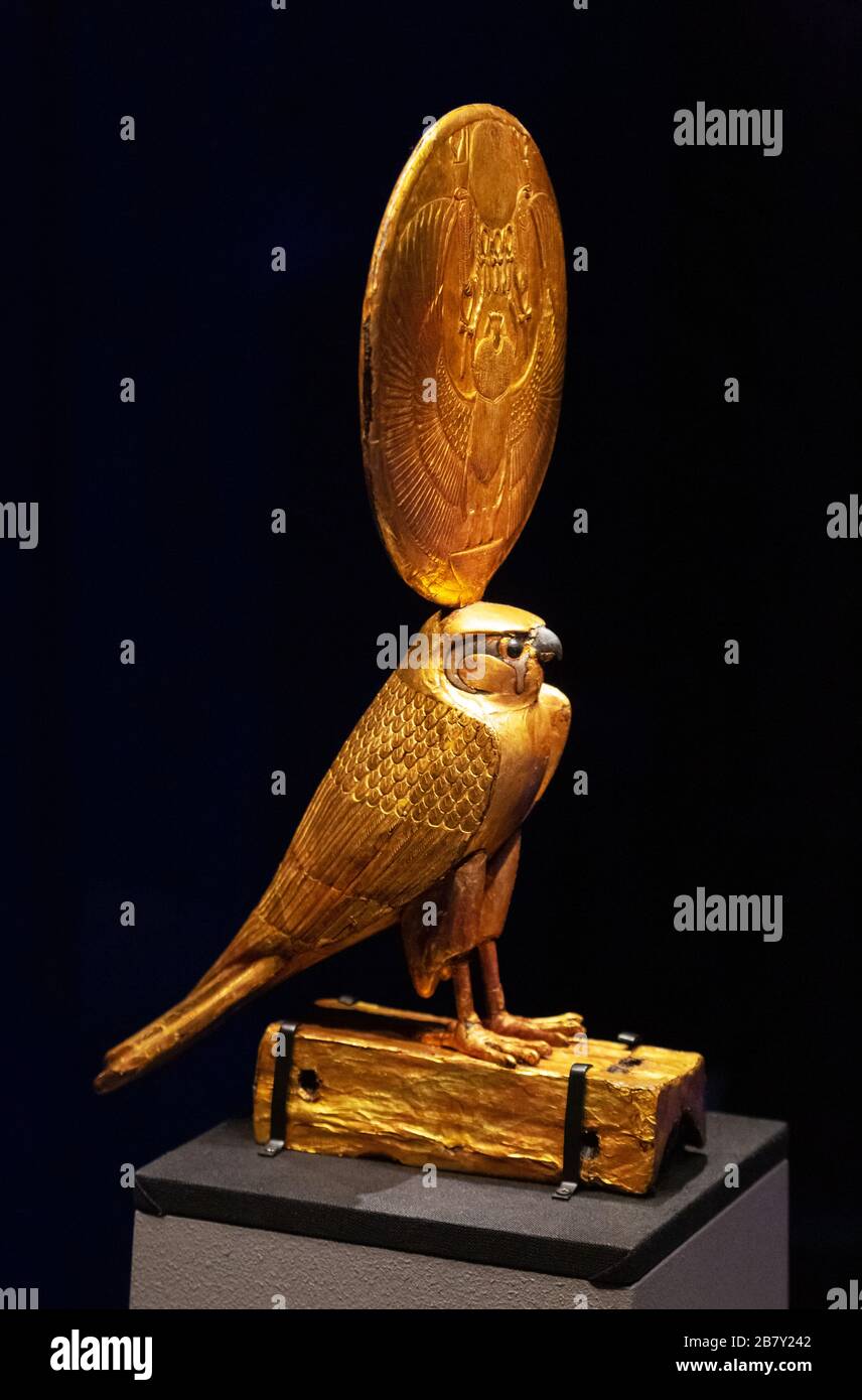 The Solar Hawk - Ancient egyptian god Horus with the sun on its head, Gilded wooden statue from Tutankhamuns tomb treasures Stock Photo