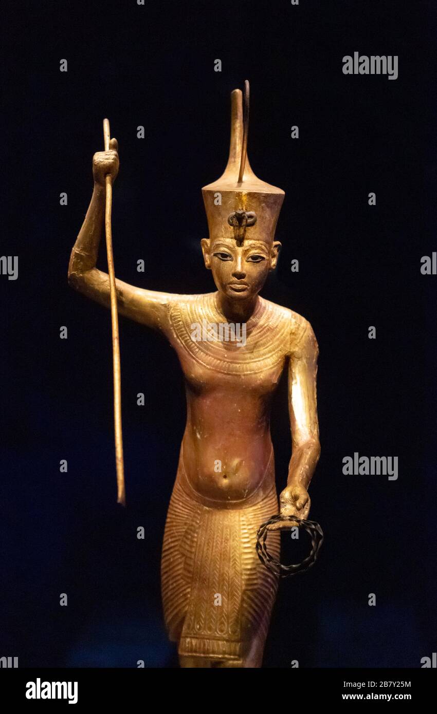 Tutankhamun statue; Detail from Gilded wooden statue of Tutankhamun holding a harpoon; Treasures from Tutankhamuns tomb. Ancient Egypt treasures Stock Photo