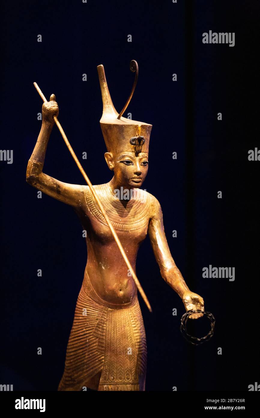 Tutankhamun statue; Detail from Gilded wooden statue of Tutankhamun holding a harpoon; Treasures from Tutankhamuns tomb. Ancient Egypt treasures Stock Photo