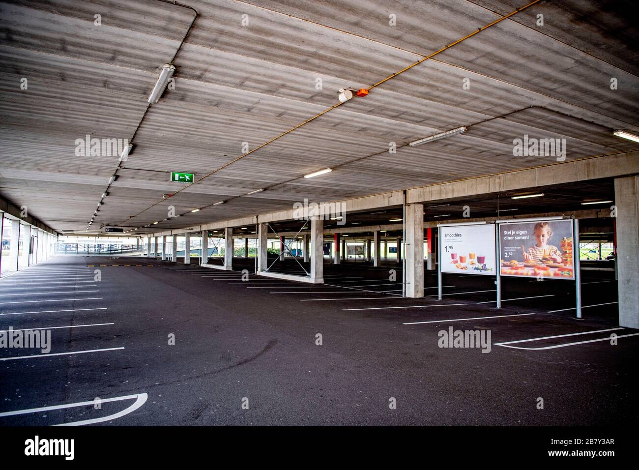 an empty parking lot at an ikea store due to lack of customers as the store is closed ikea is closing all its stores in the netherlands as the covid 19 coronavirus is spreading