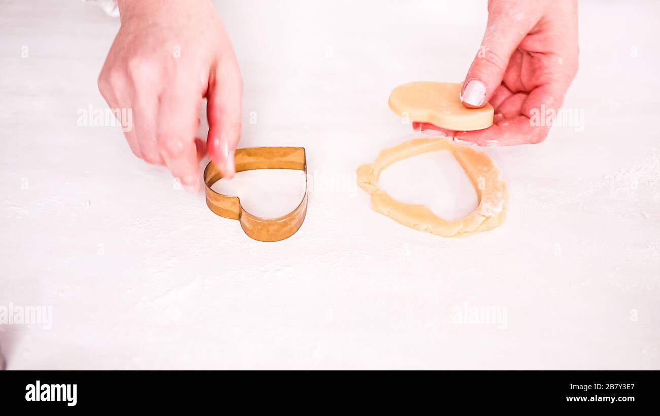 Step by step. Cutting out shapes from sugar cookie dough with cookie