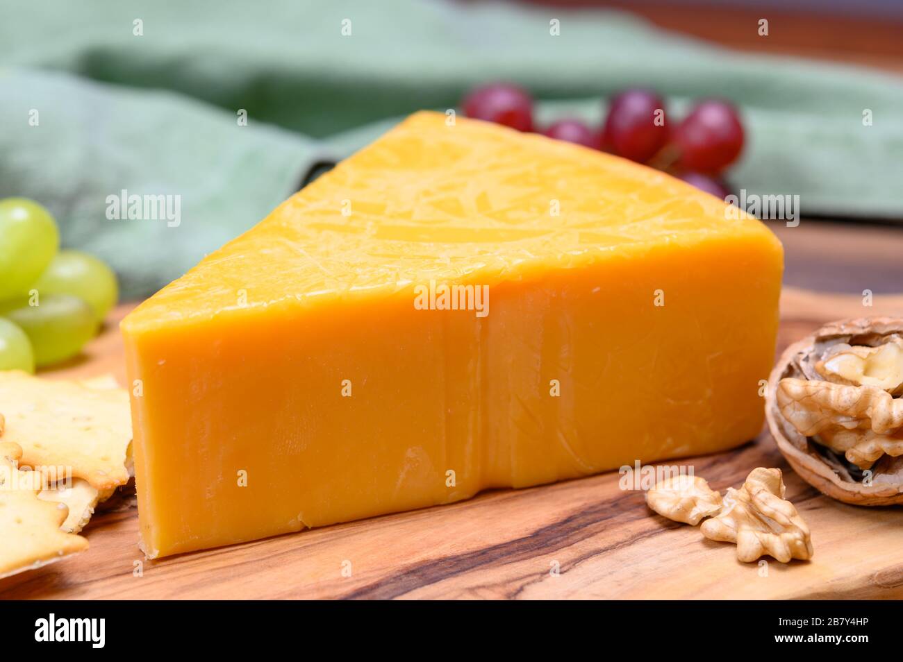 Cheese collection, yellow matured cheddar cheese triangle piece from ...