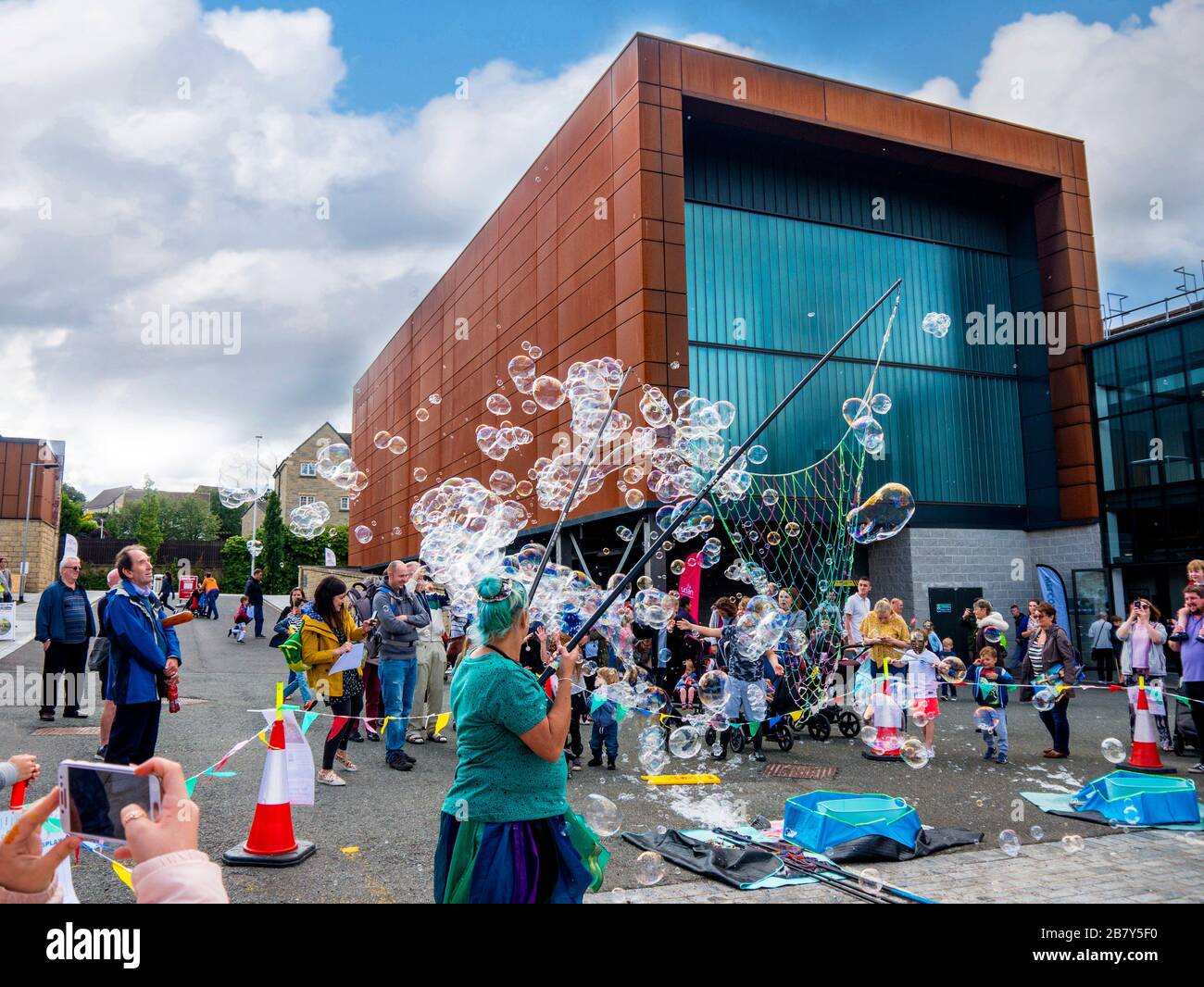 Magnificent display of Bubble Making at the celebration of the Leeds Liverpool Canal at Burnley Lancashire Stock Photo
