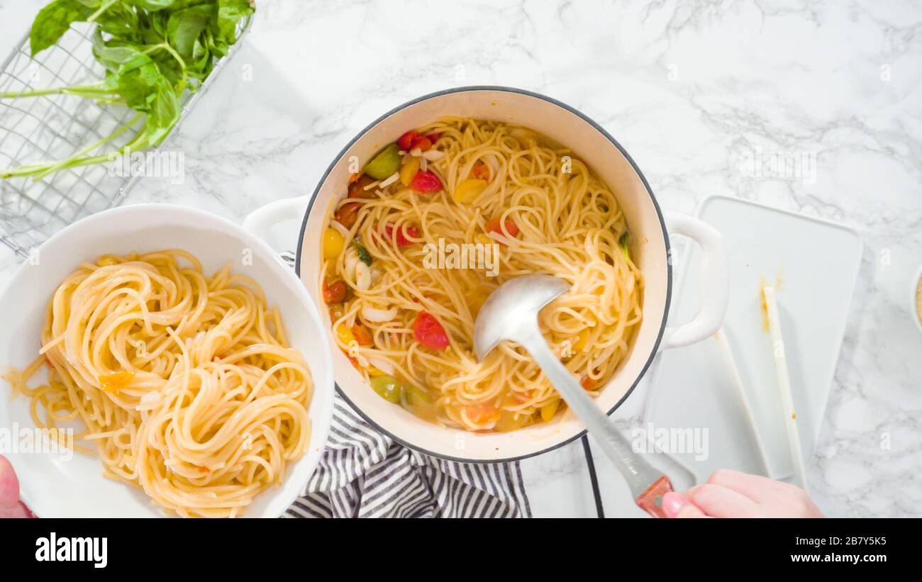 Flat lay. Step by step. Serving a onepot pasta into a white pasta