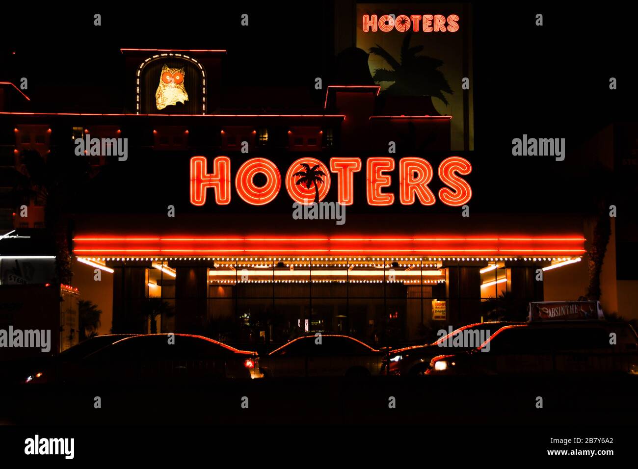 LAS VEGAS, NV, USA - FEBRUARY 2019: Signs and vehicles outside the Hooters Hotel in Las Vegas. Stock Photo