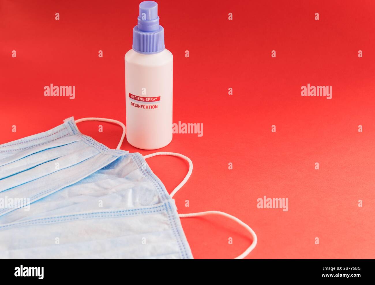 Medical mask for face and hand sanitizer gel for hand hygiene on the ...