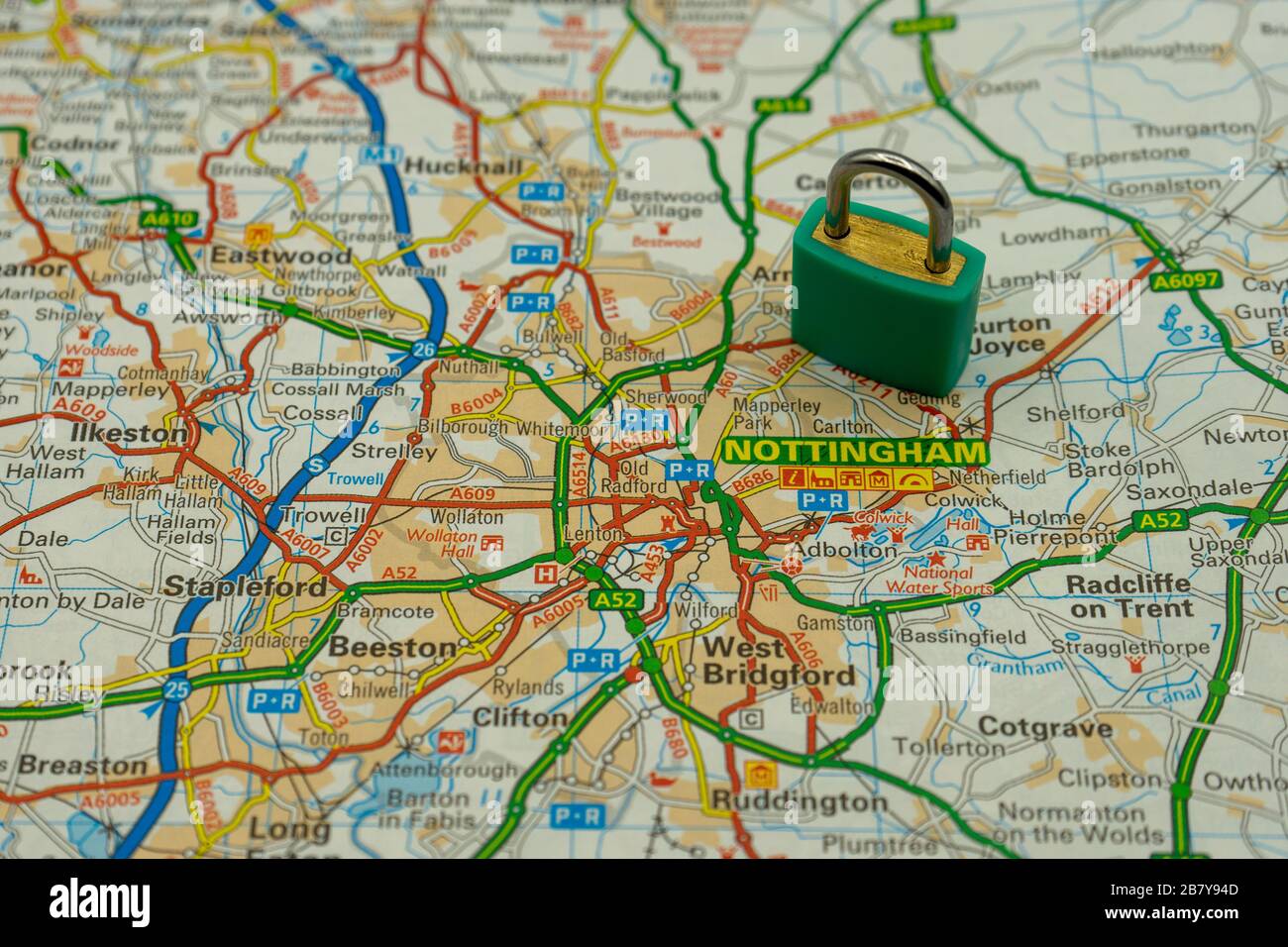 Nottingham Shown on a road map or geography map with a padlock on top to represent a city in lock down Stock Photo
