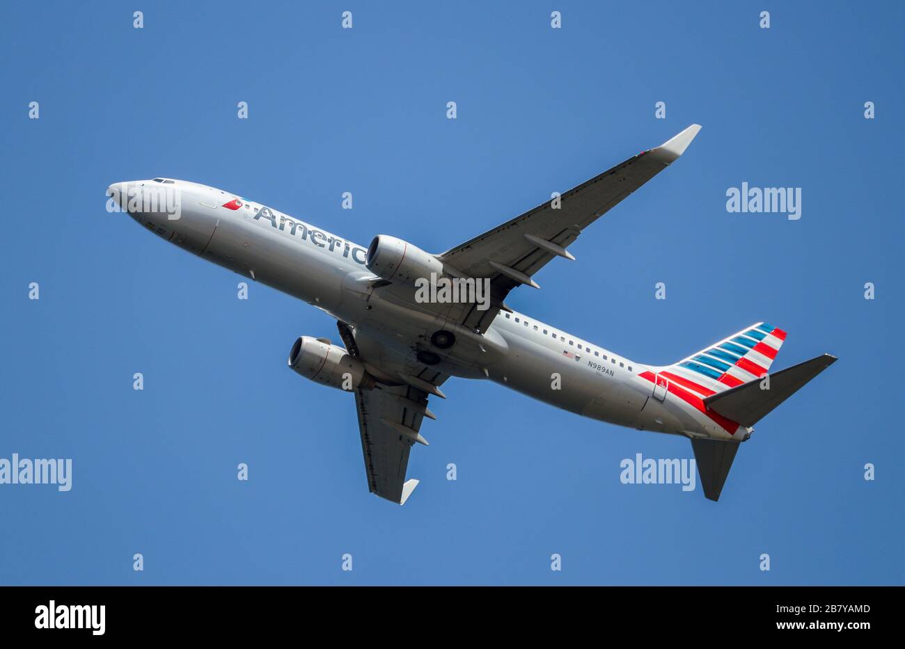 Portland, OR / USA - circa 2018: Looking up at an American Airlines Boeing 737-800NG that took off from Portland International Airport (PDX) near by. Stock Photo