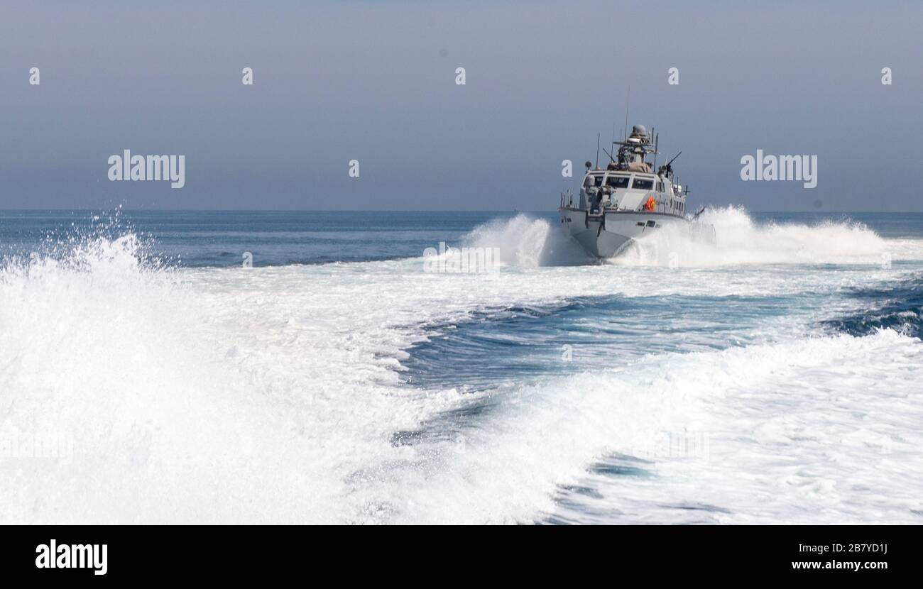 ARABIAN GULF (March 12, 2020) A Mark VI patrol boat attached to Commander, Task Force 56 participates in an underwater detonation exercise in the Arabian Gulf, March 12. This event highlights one of many core competencies that the Coastal Riverine Force provides in support of U.S. 5th Fleet operations. CTF 56 is responsible for the planning and execution of expeditionary missions including coastal riverine operations in the U.S. 5th Fleet area of operations. (U.S. Navy photo by Mass Communication Specialist 2nd Class William Collins III) Stock Photo