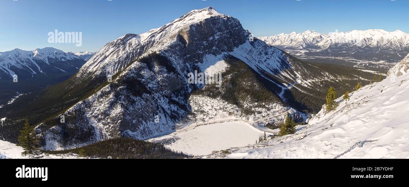 East End of Rundle, Rugged Mountain Peak Scenic Winter Panoramic Landscape View, Mountain Climbing above City of Canmore in Bow Valley, Alberta Stock Photo