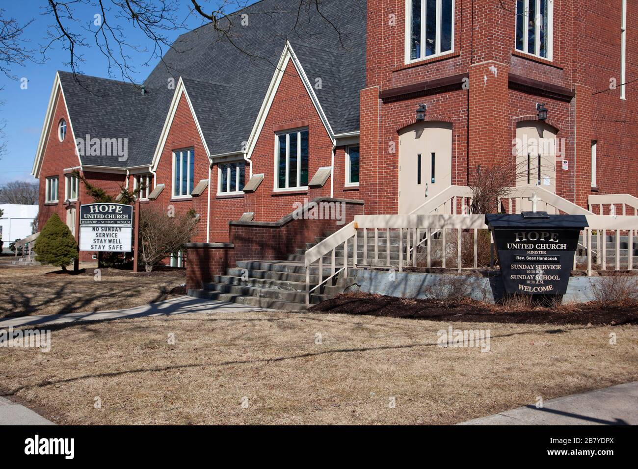 March 18, 2020- Halifax, Nova Scotia: The Hope United Church in Halifax displays a sign advising congregation that church is canceled due to the COVID Stock Photo