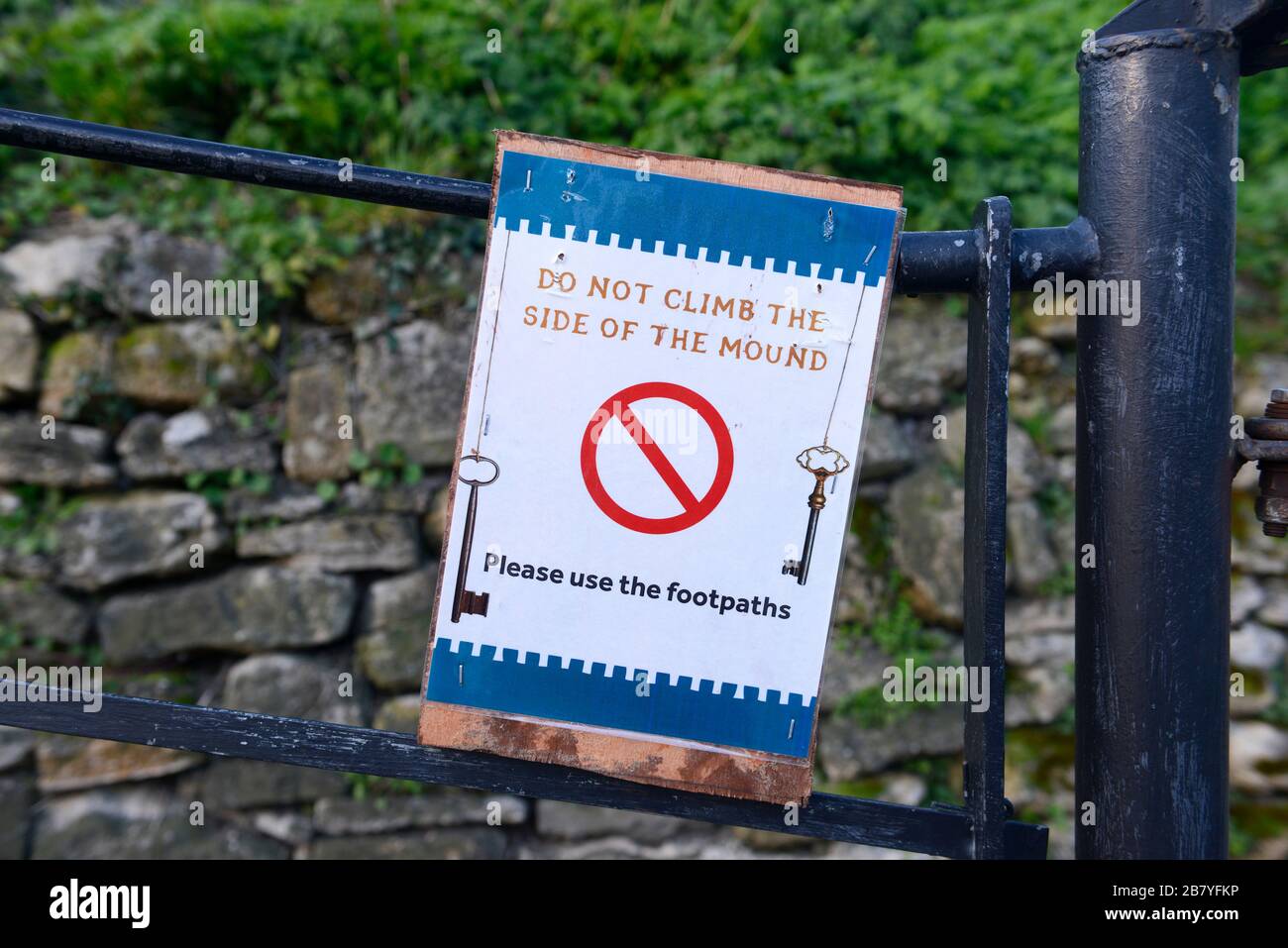 Do not climb the side of the mound notice at the old Motte and Bailey mound in Oxford castle, Oxford, UK Stock Photo