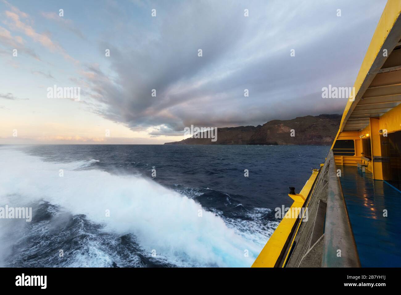 Clouds at dusk at sea from cruise ship railing Stock Photo - Alamy