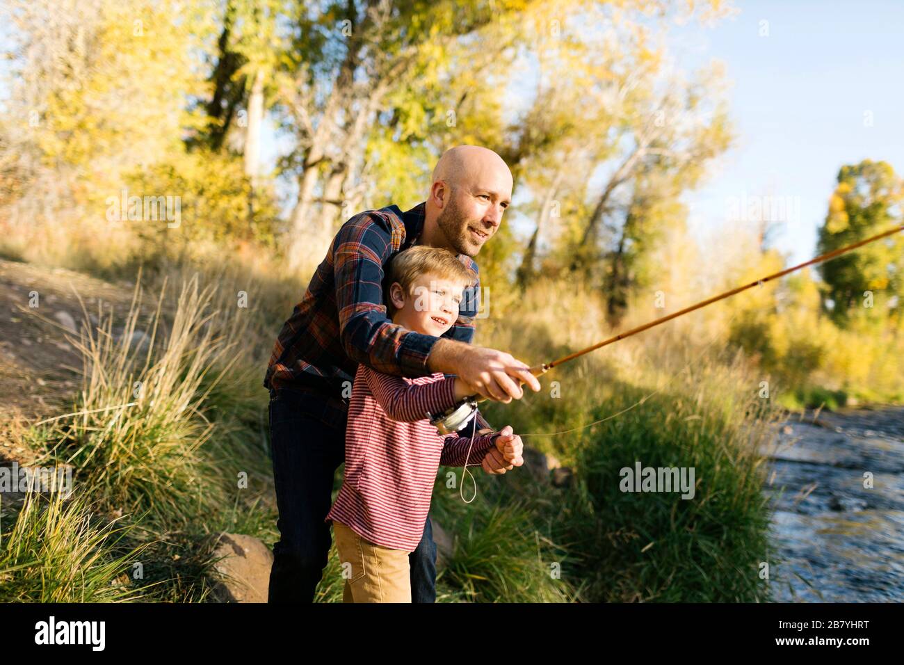 Two boys fishing river hi-res stock photography and images - Alamy