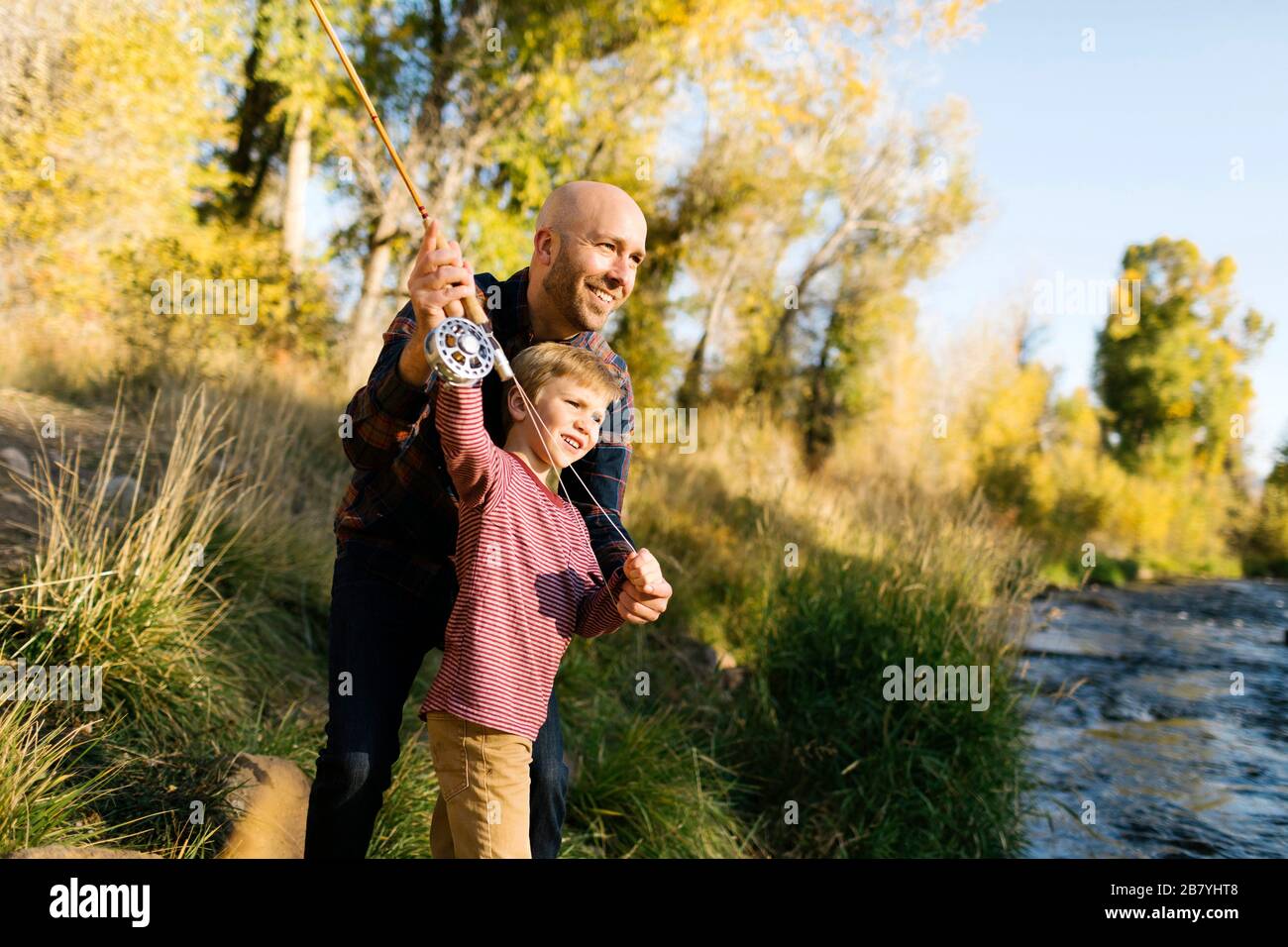 Two boys fishing river hi-res stock photography and images - Alamy