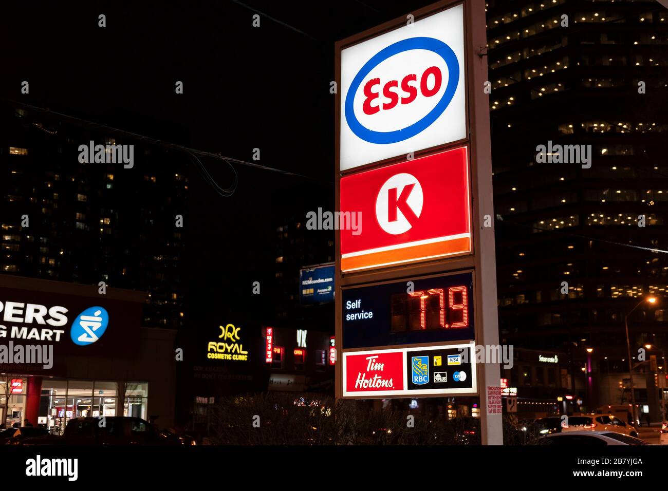 Toronto, Canada. 18th March 2020. Gas price is at 77.9 cents per litre at an Esso gas station in Toronto's suburb of North York. Gas price has been dropping due to the COVID-19 outbreak. Dominic Chan/EXImages Stock Photo