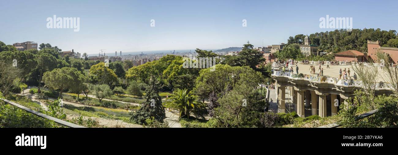 BARCELONA, SPAIN - JUNE 22, 2016: Super wide panorama of Park Guell. A green park with a Gaudi museum and panoramic views. architect Gaudi. Beautiful Stock Photo