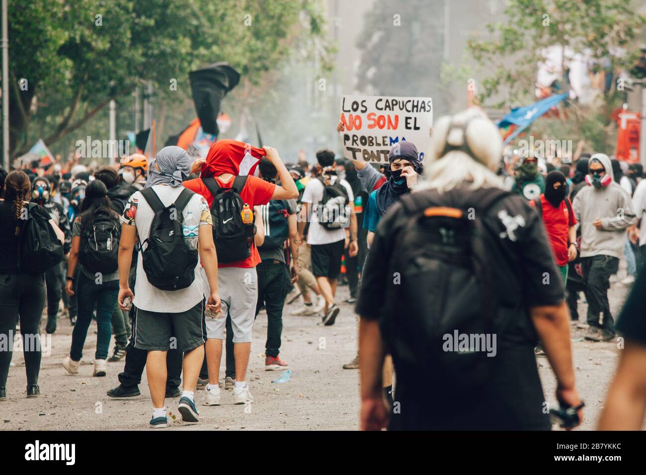 SANTIAGO, CHILE-NOVEMBER 8, 2019 - Banner with the caption 'The hooded are not the problem ....' during the protests against the government of Pinera, Stock Photo