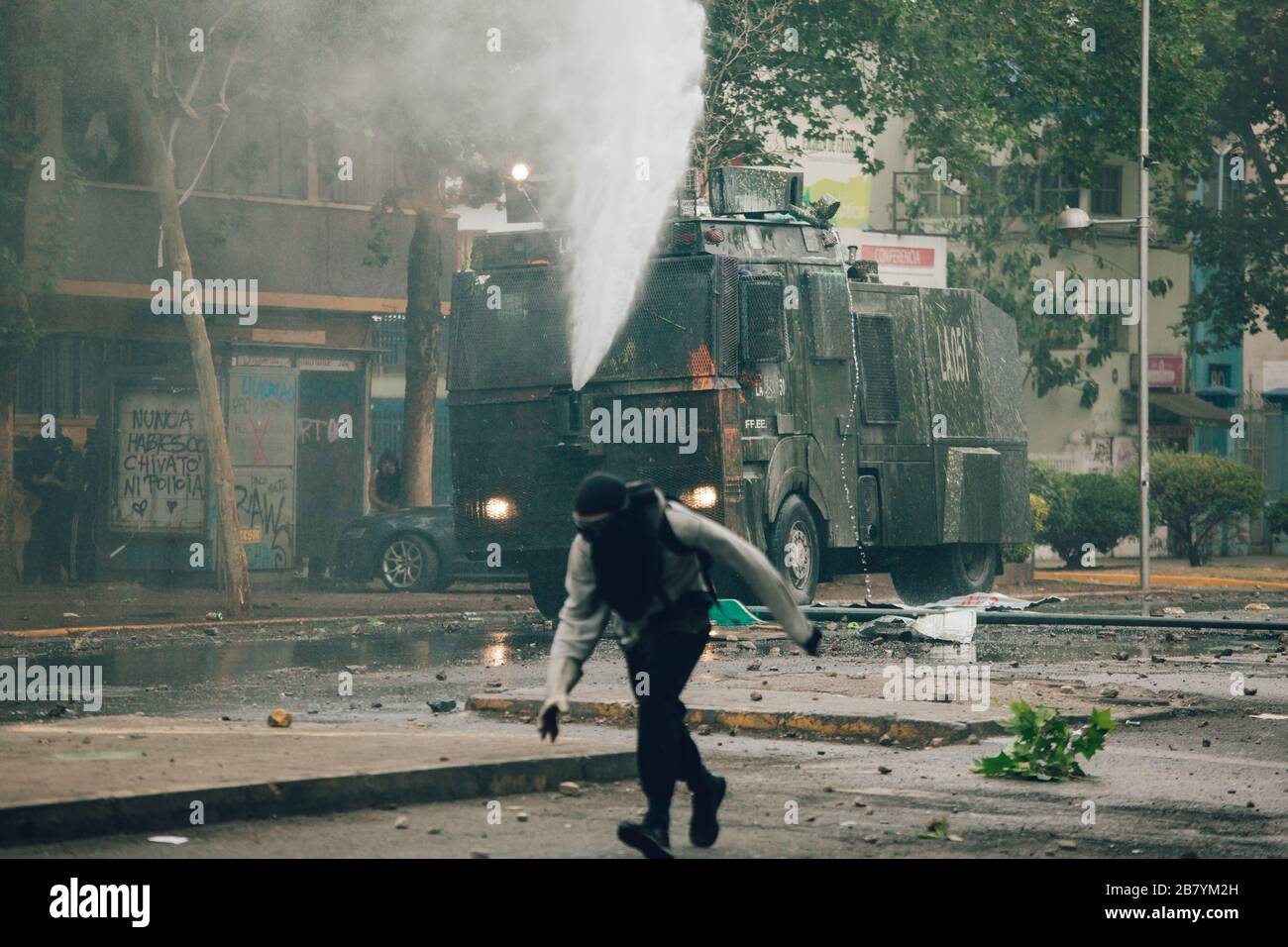 SANTIAGO, CHILE-NOVEMBER 8, 2019 - Water Cannon dispersed protesters during the protests against the government of Sebastian Pinera, for the social cr Stock Photo