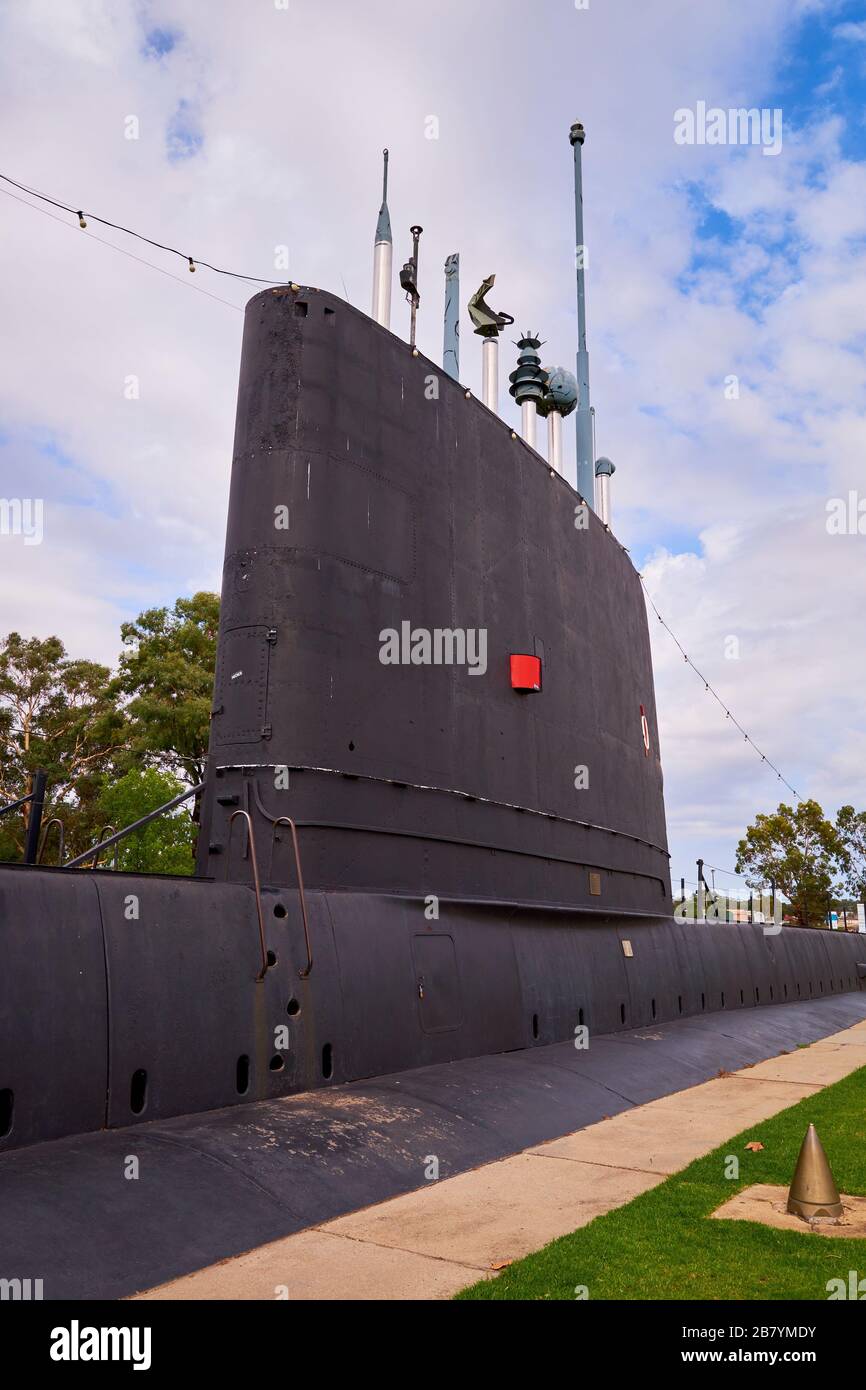 Conning tower and periscope of the actual HMAS Otway submarine, half buried. At the Commander Holbrook park in Hollbrook, NSW, Australia. Stock Photo