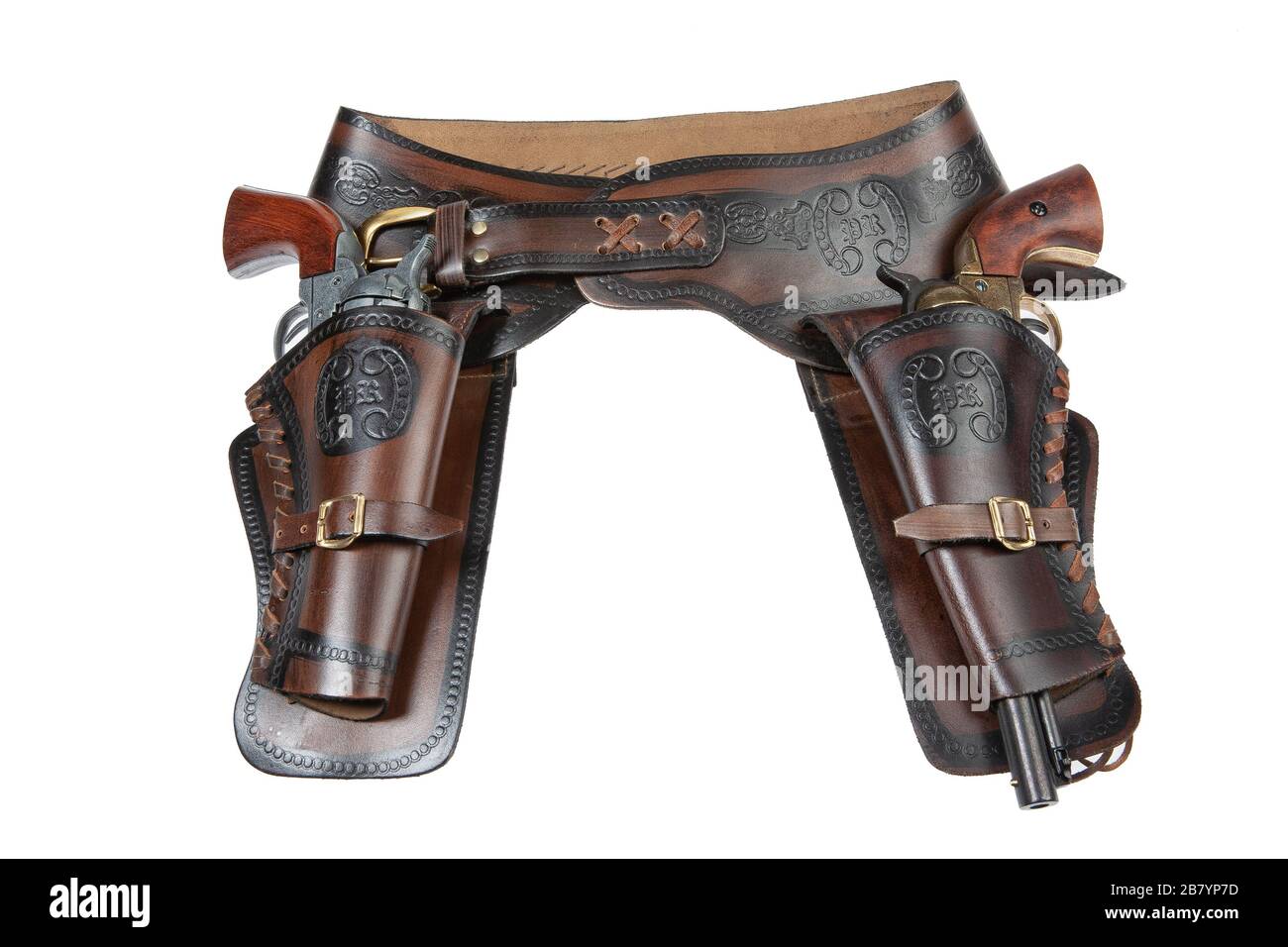 Leather cowboy holster and revolver on an isolated studio background