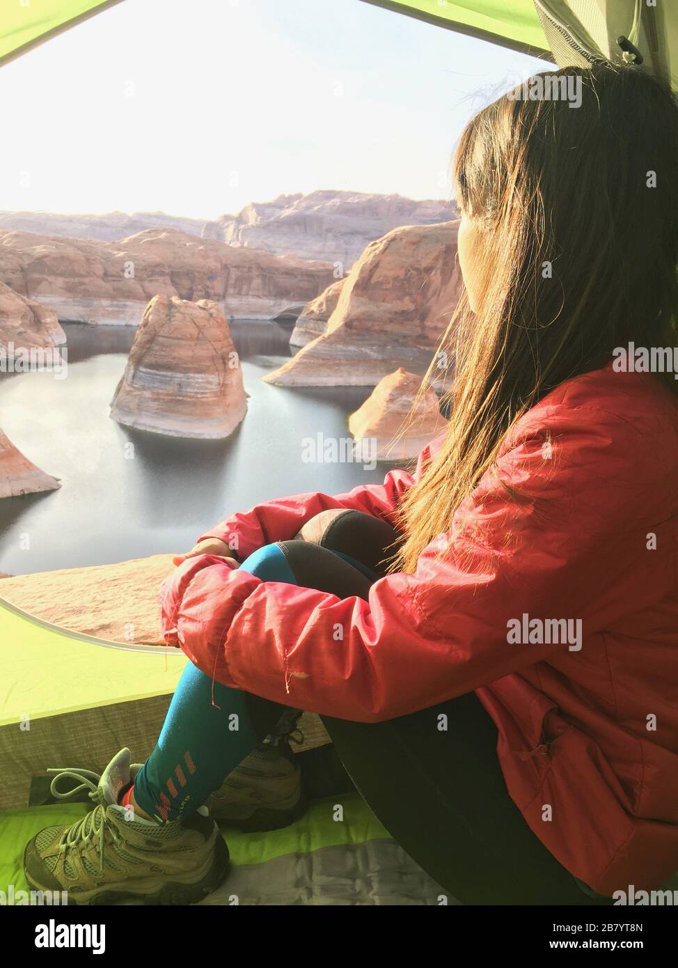 Woman backpacking camping at Reflection Canyon in Utah USA Stock Photo