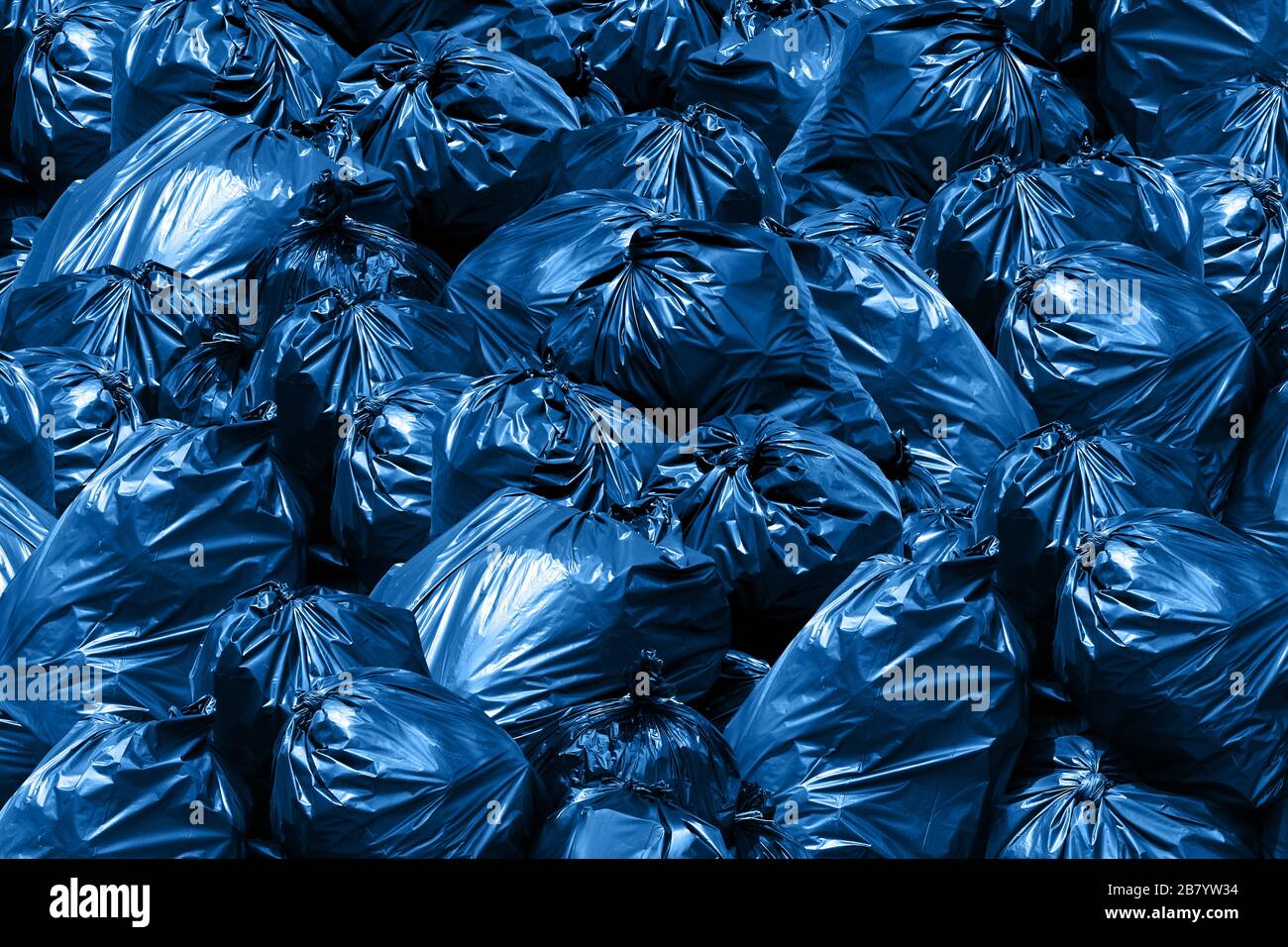 Background pile of trash bags, blue Bin,Trash, Garbage, Rubbish