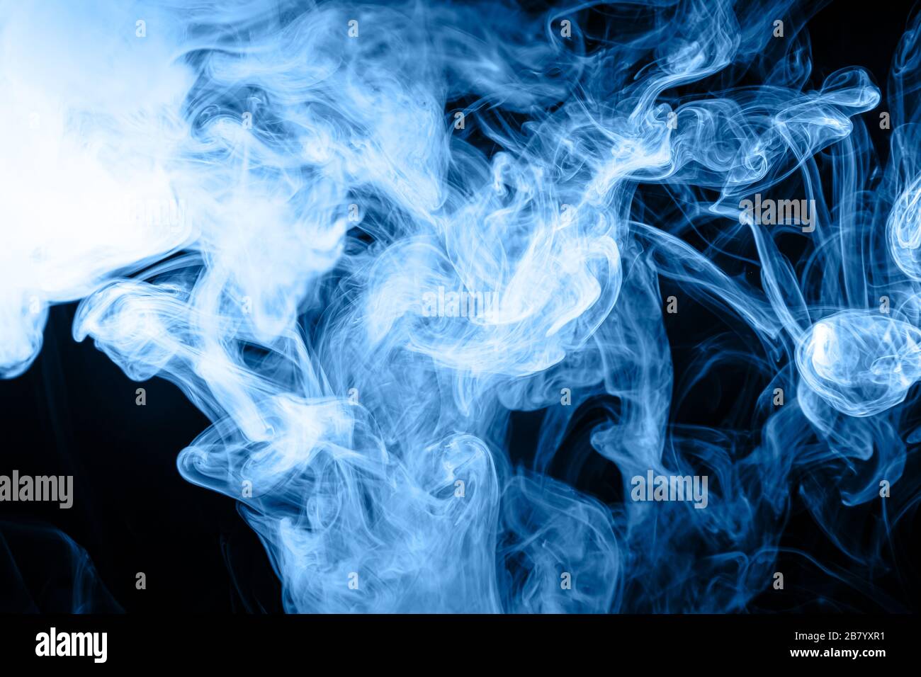 close up of colorful steam smoke in mystical and fabulous forms on ...