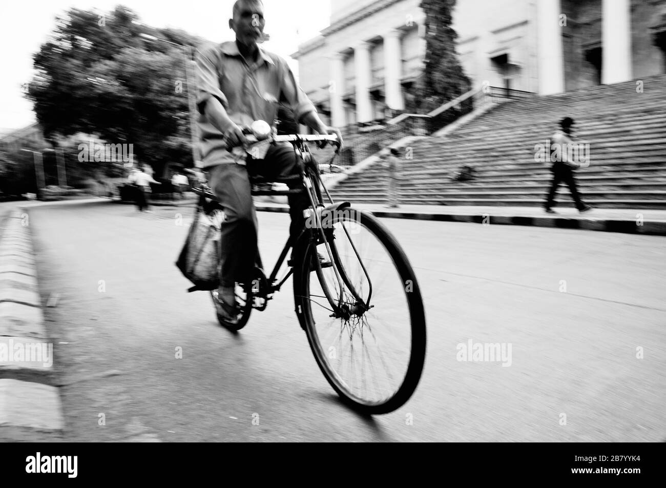 Cyclist, Town Hall, Asiatic Library, Horniman Circle, Fort, Bombay, Mumbai, Maharashtra, India, Asia Stock Photo
