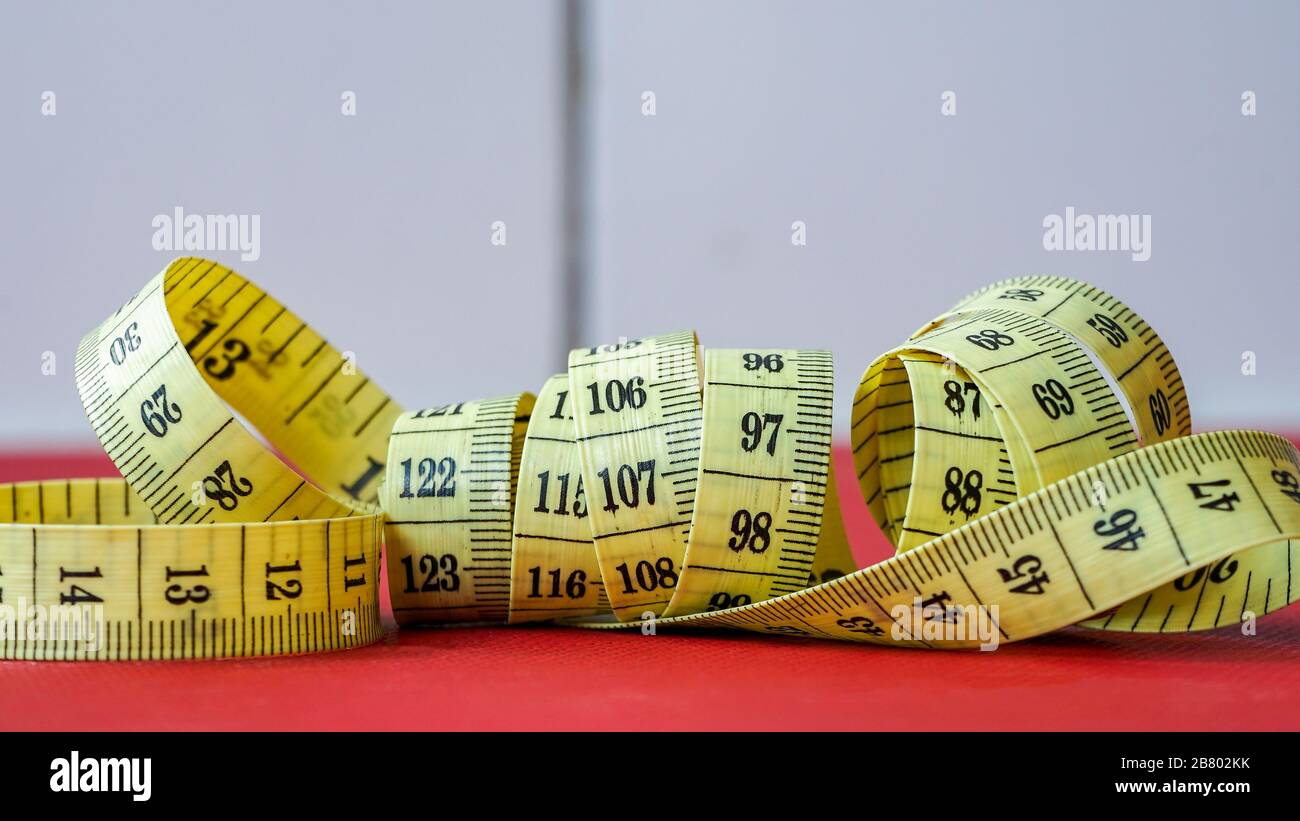 Close up of the tape measure on the table Stock Photo